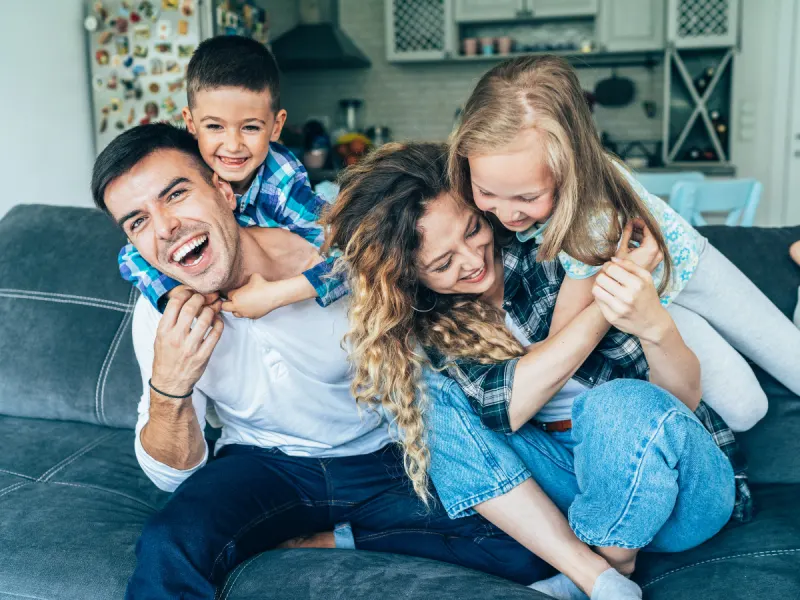 Happy Los Angeles family at home