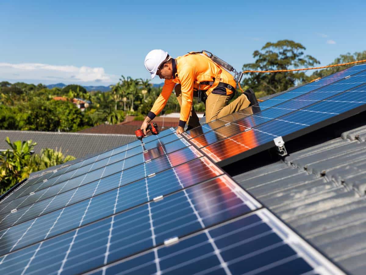 Solar panels generating electricity for a home by Green360Solutions